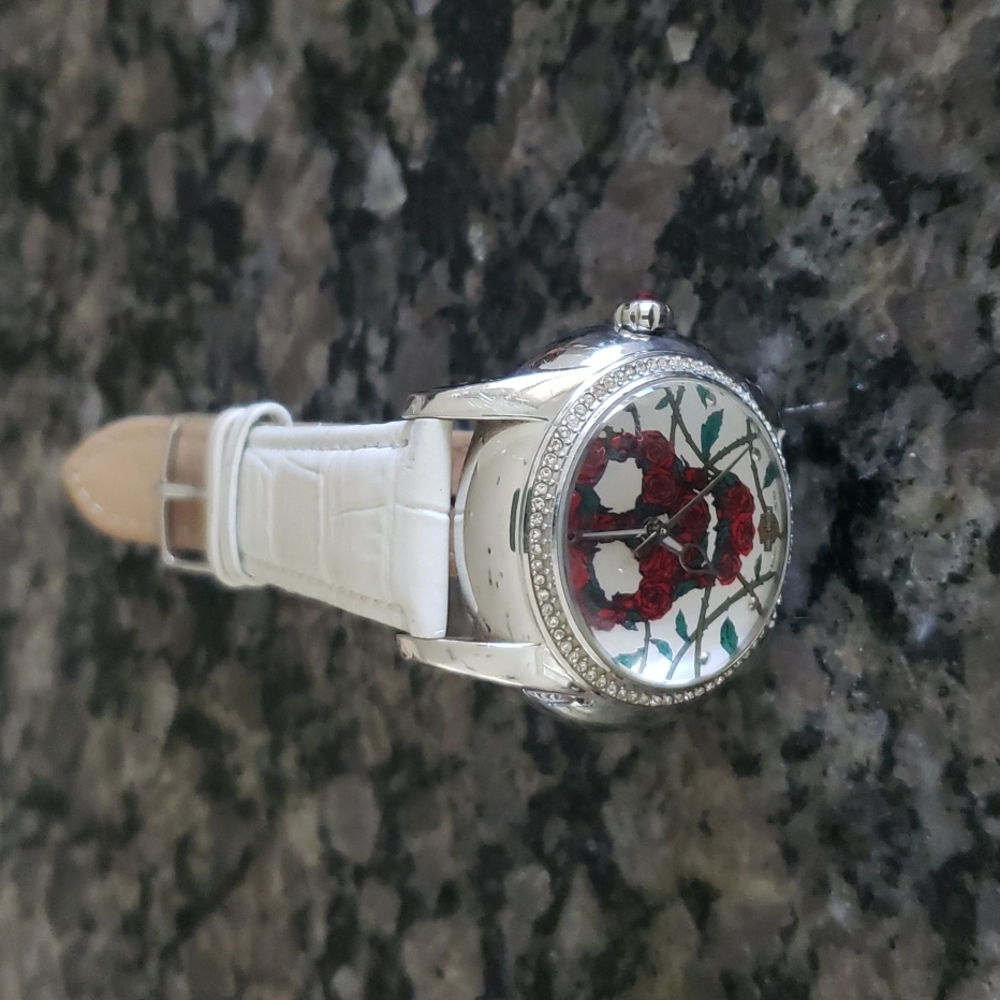 HARLY-DAVIDSON LADIES WATCH BARELY WORN. 50 METERS WATER RESISTANT BY BULOVA.